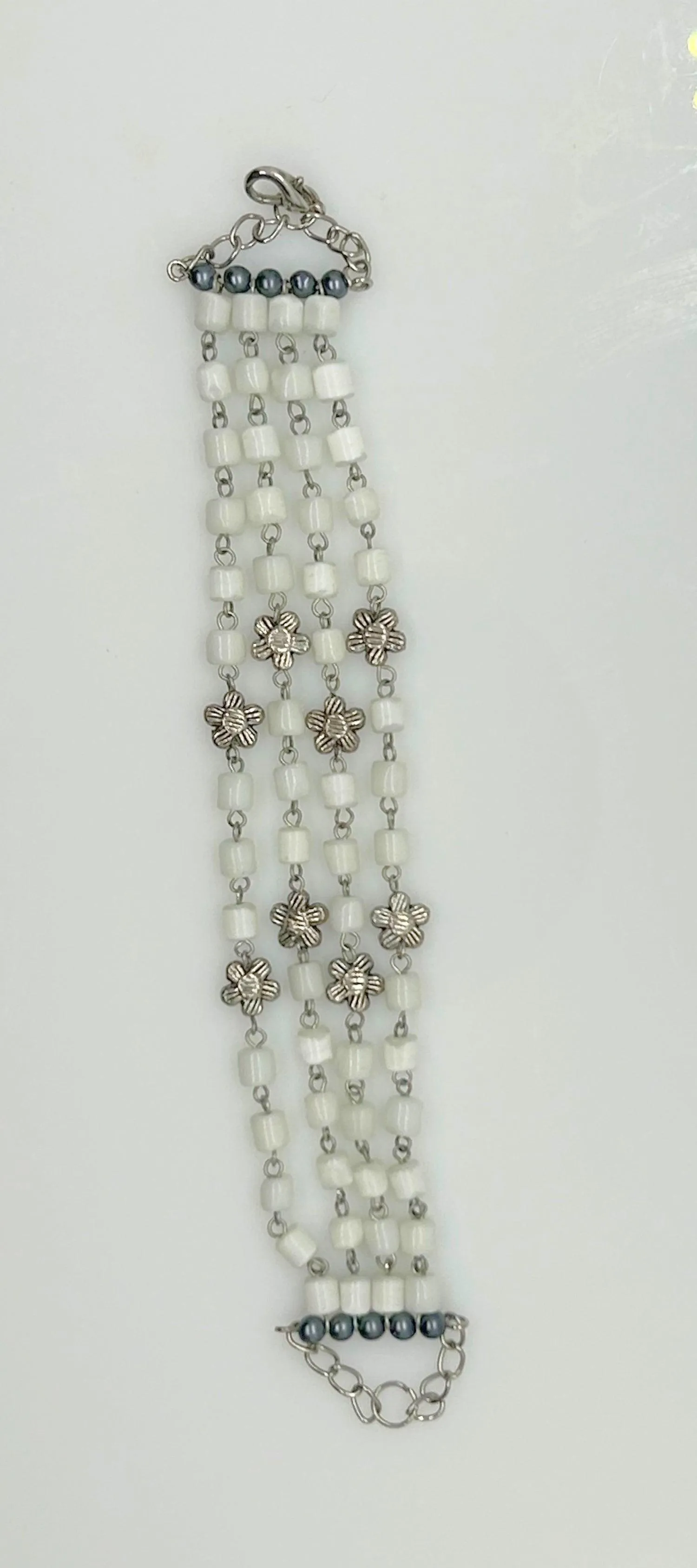 Antique Shimmering White Bead Four Strand Bracelet