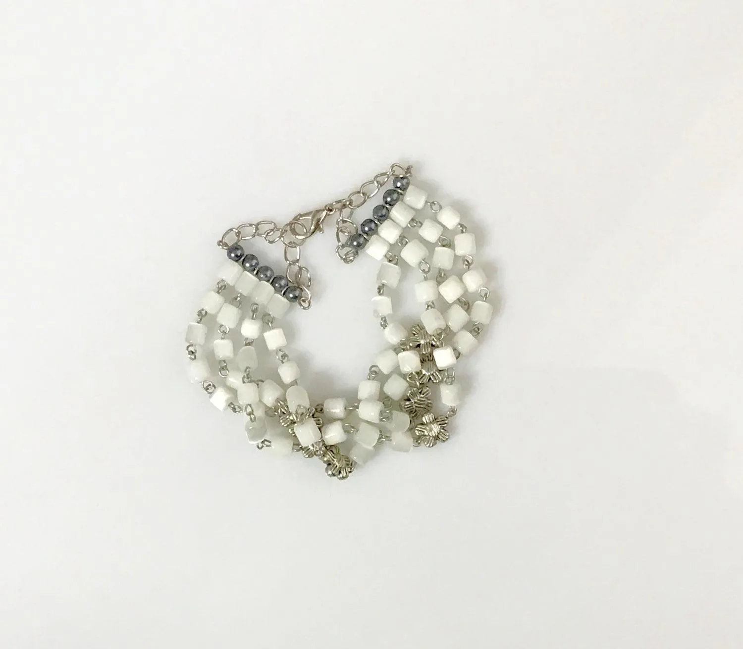 Antique Shimmering White Bead Four Strand Bracelet
