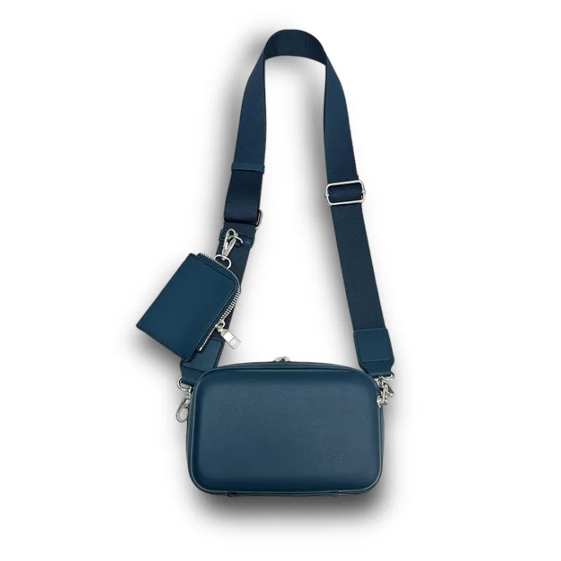 Faux leather hard shell crossbody bag with zip pouch