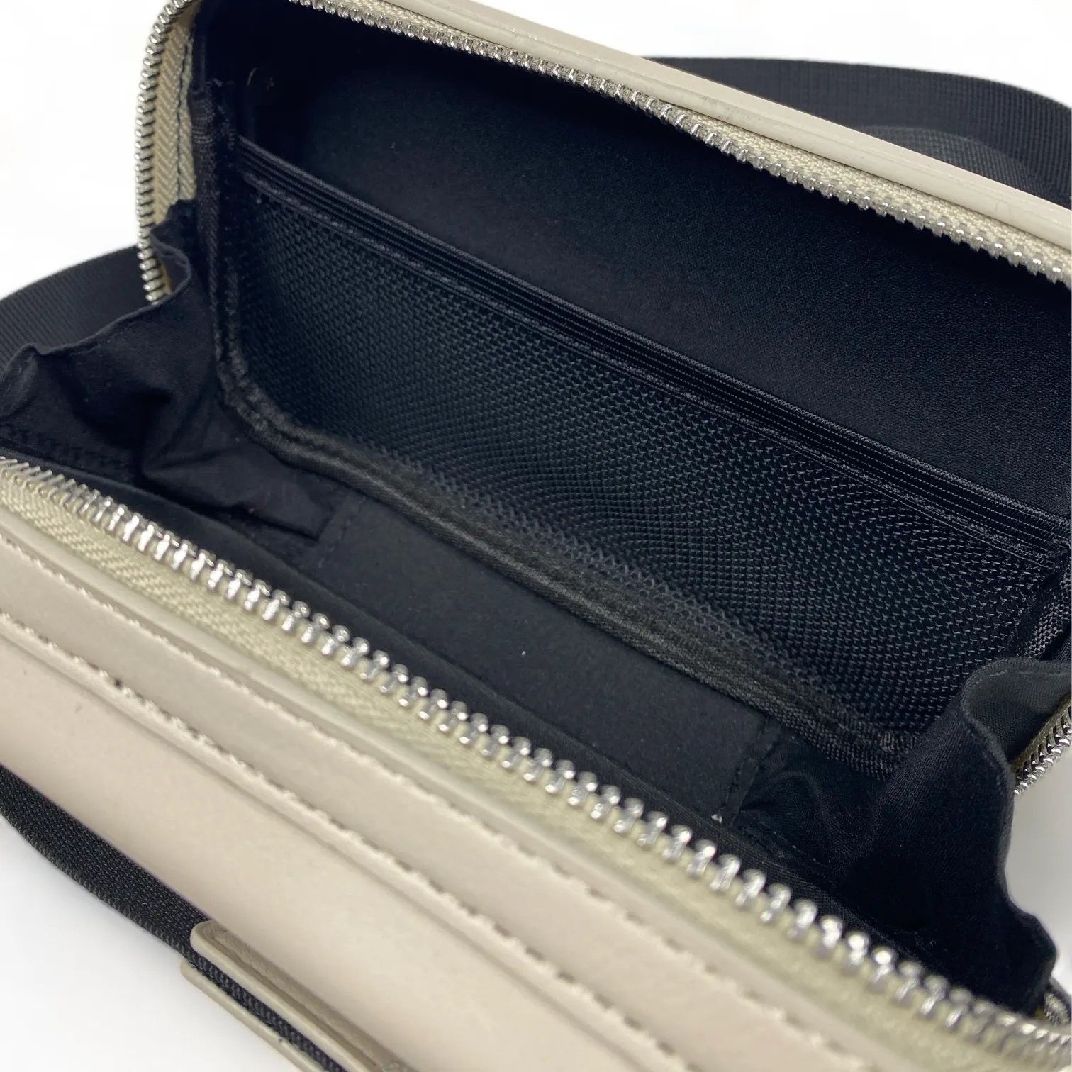 Faux leather hard shell crossbody bag with zip pouch