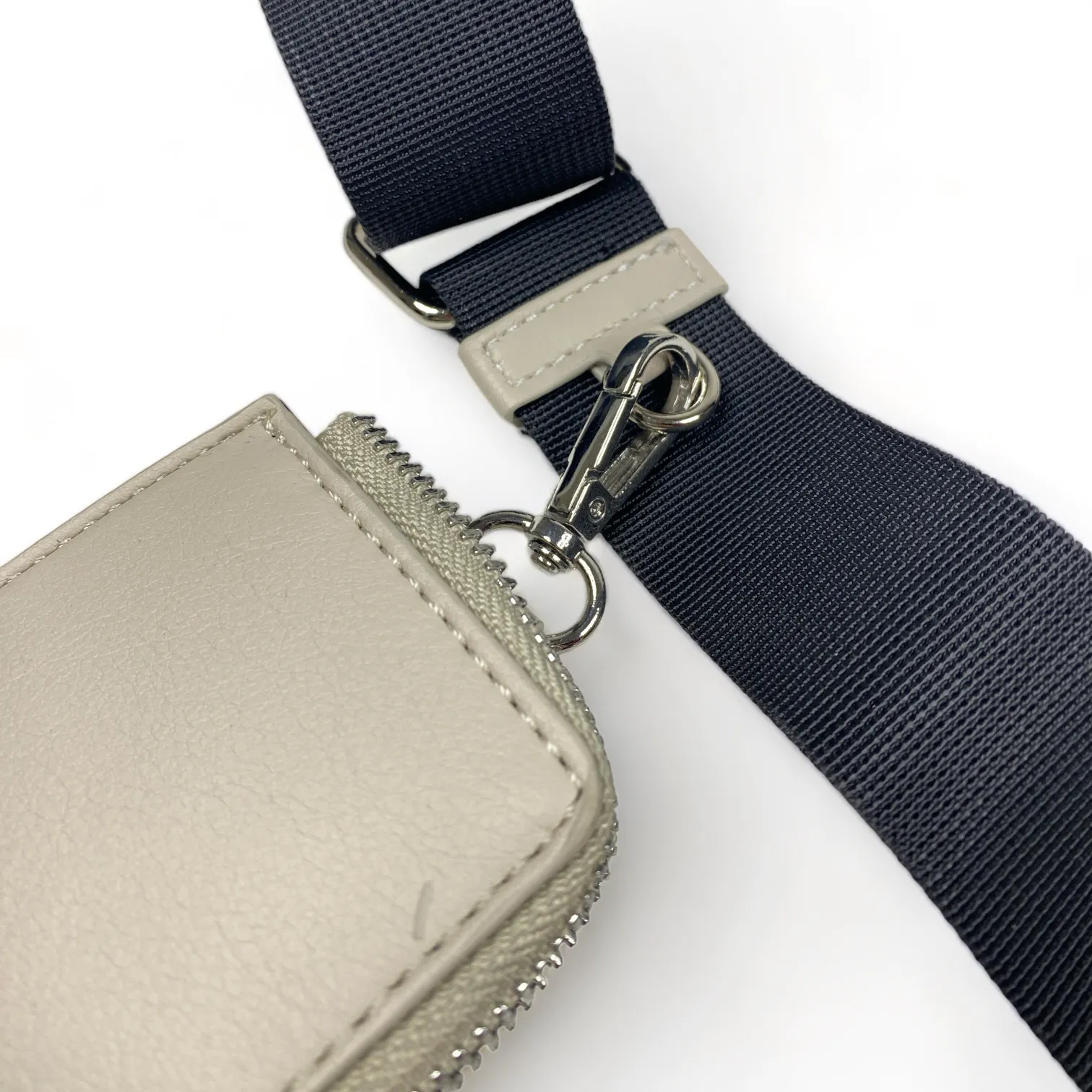 Faux leather hard shell crossbody bag with zip pouch