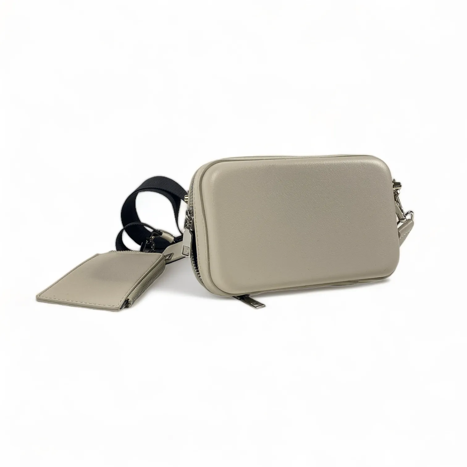 Faux leather hard shell crossbody bag with zip pouch