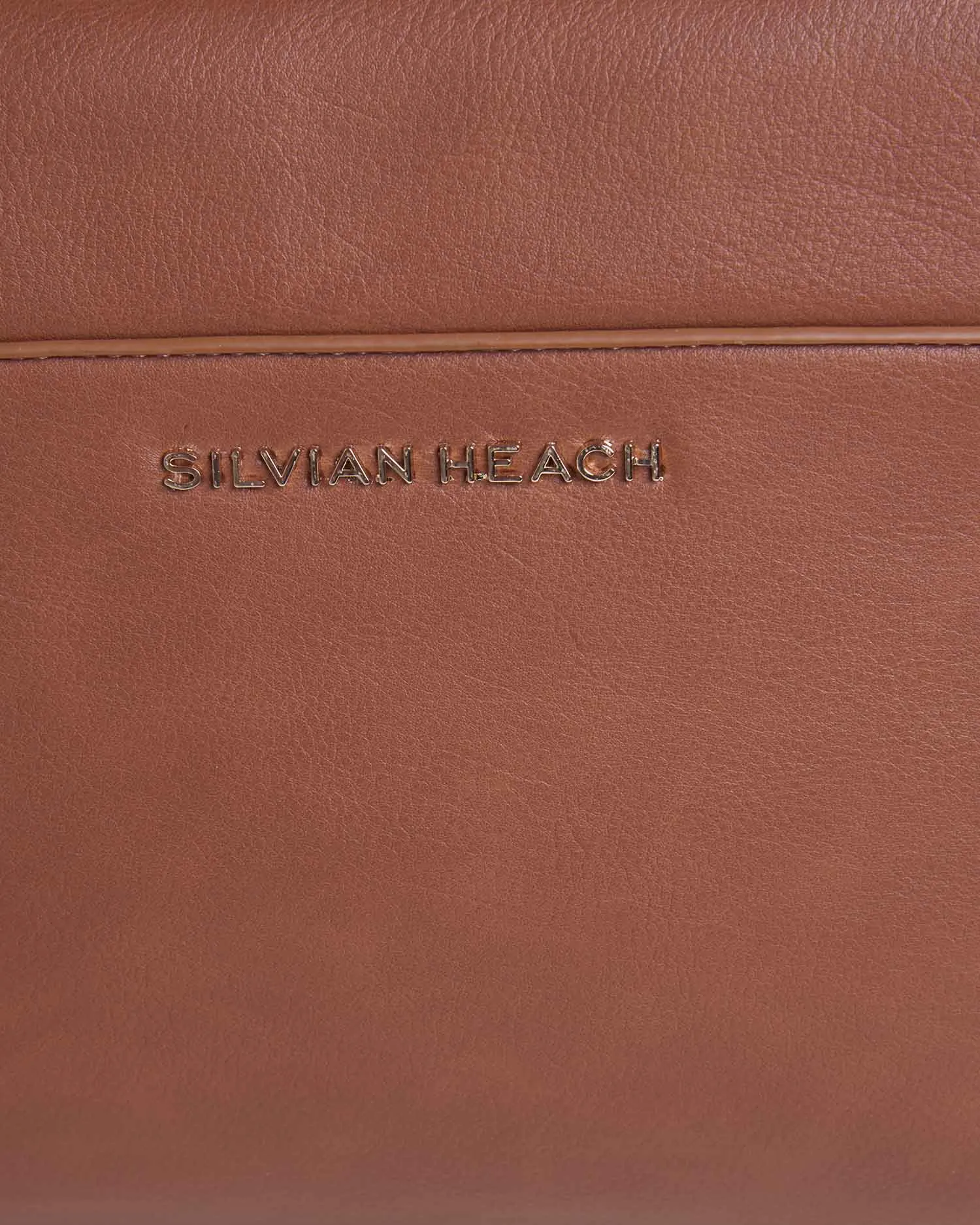 Handbag zip closure flap