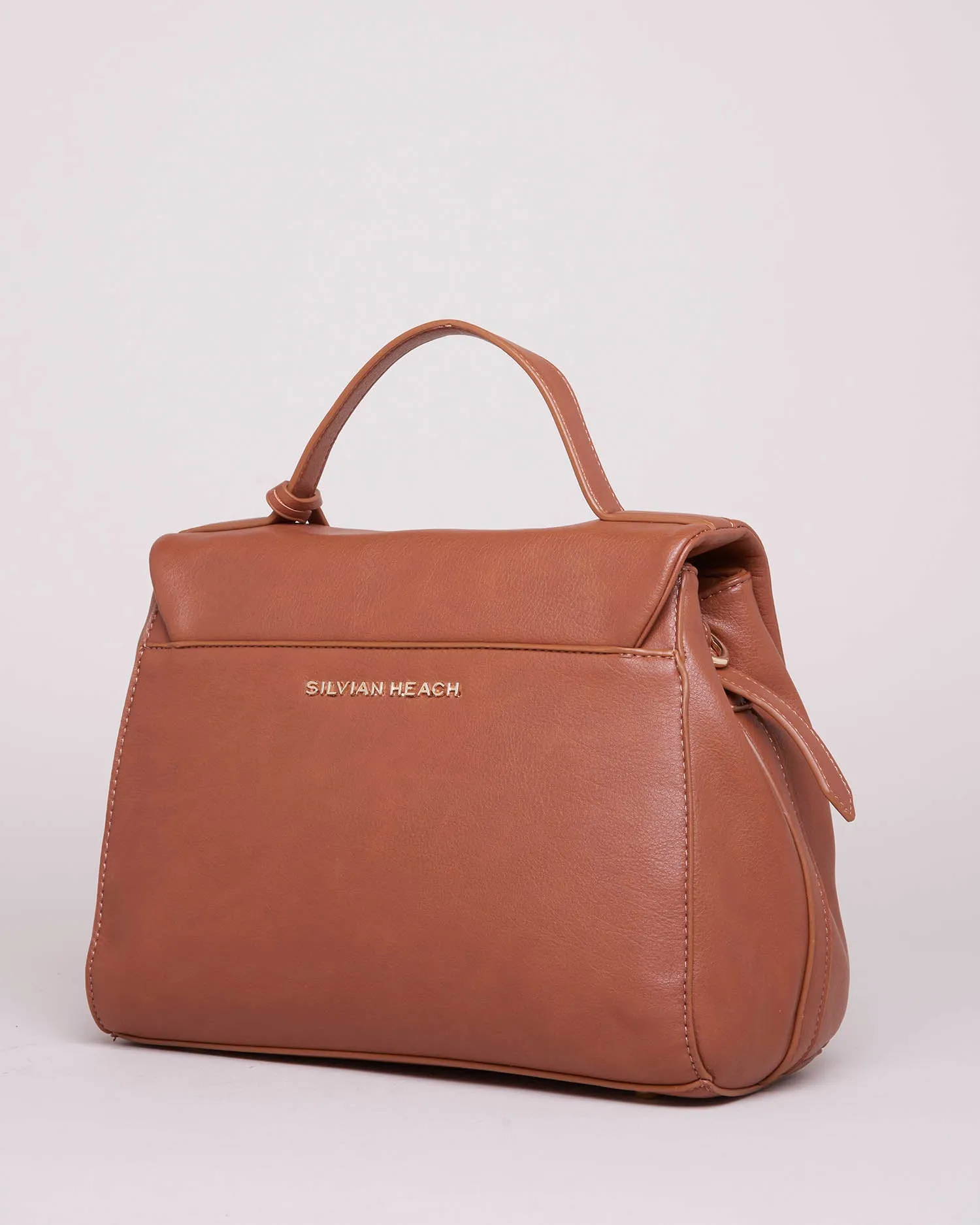 Handbag zip closure flap